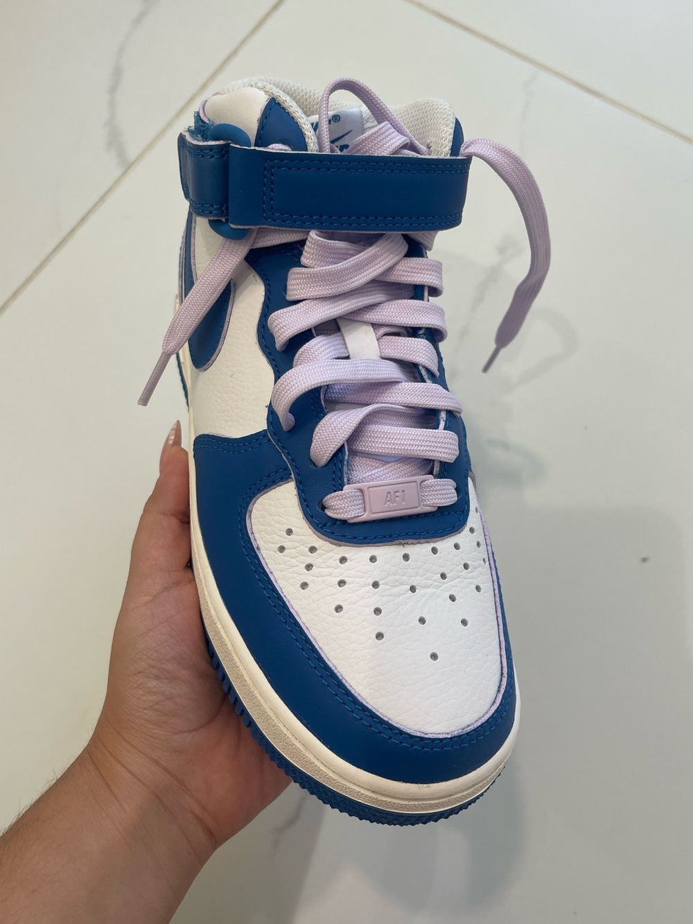 Nike women’s High-Top Sneakers in Blue and Lavender